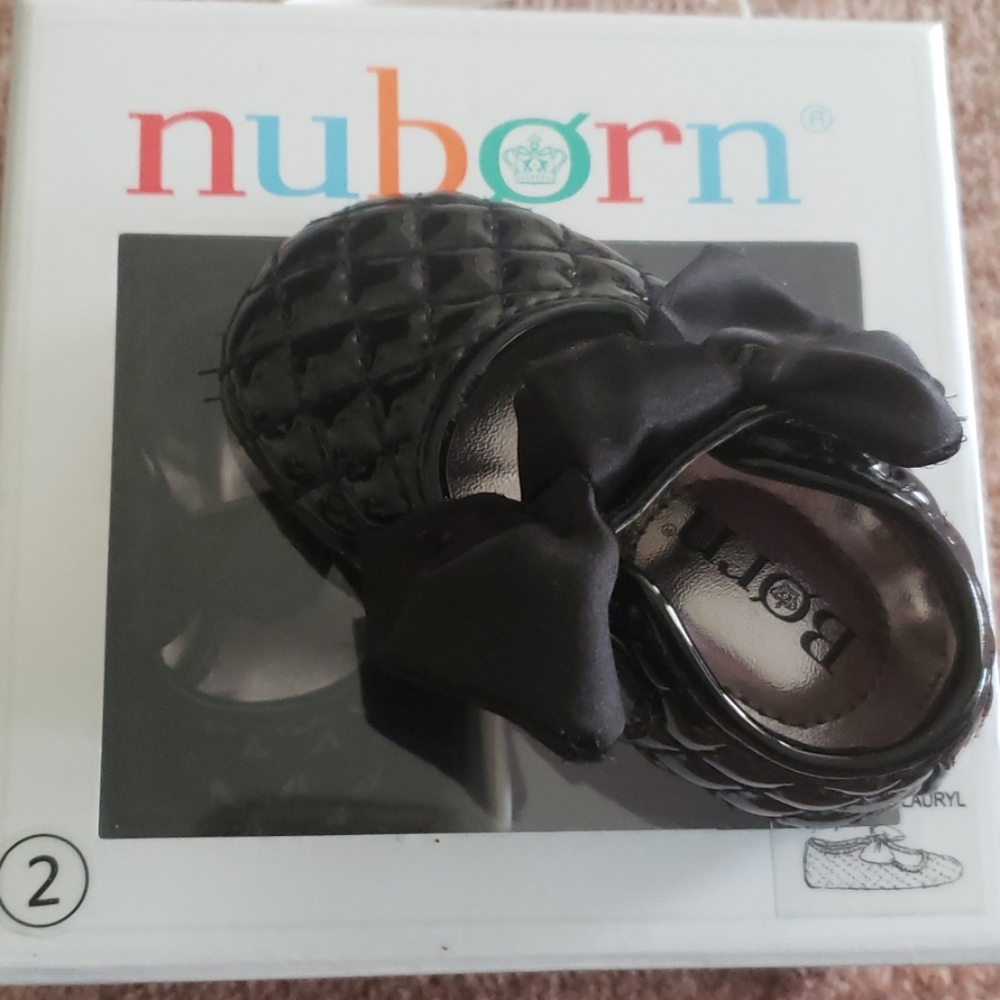 Black textured patent baby shoe